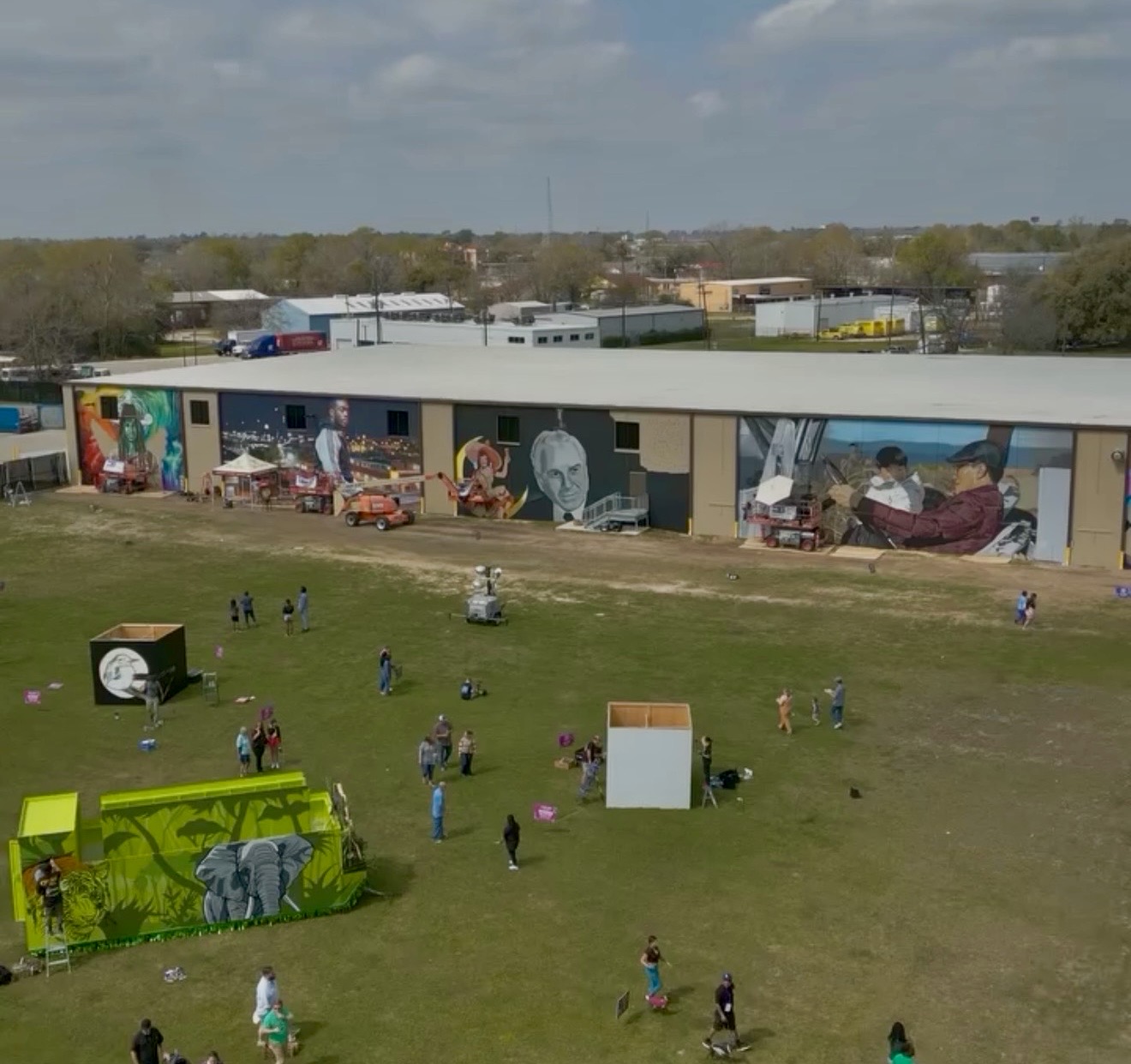 Large-scale mural installed for an agency activation on a concrete building